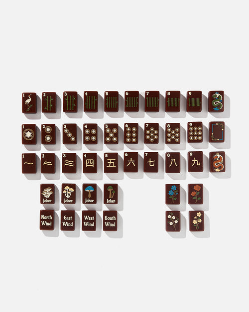 The Redemption Line mahjong tile set laid out in rows, showing one of each tile