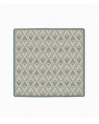 Patina mahjong mat with an antique-inspired diamond pattern in slate blue, beige and gray